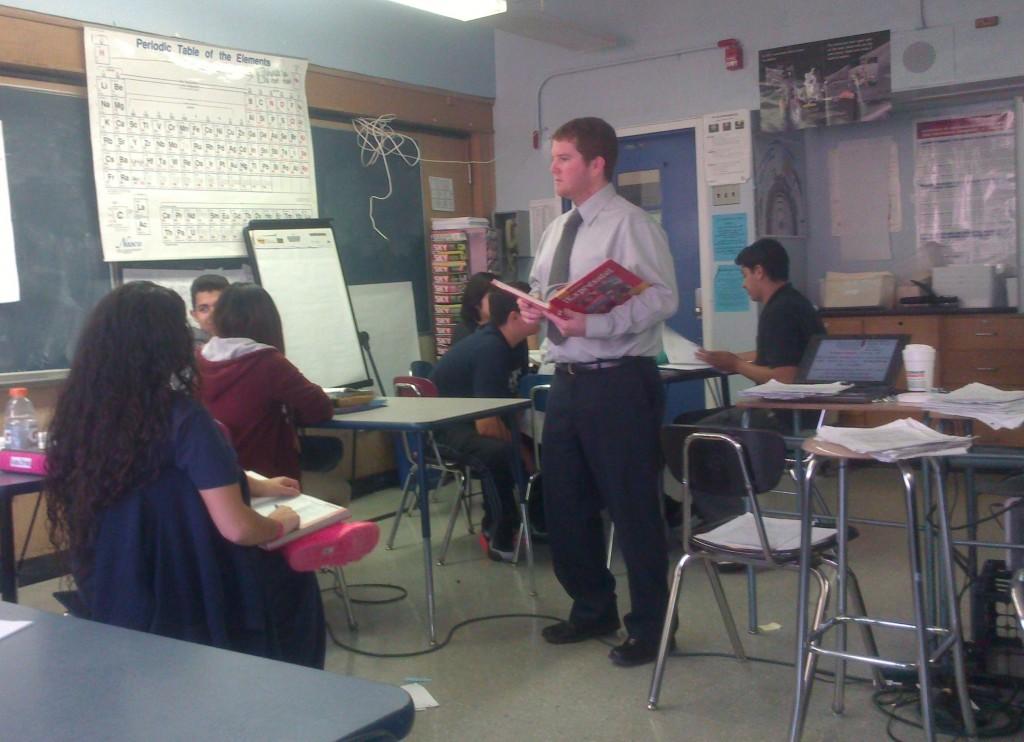 Approaching his job with confidence but an easygoing attitude, Mr. Reff converses with his students in one of his Spanish classes. Photo by Arthur Wilson