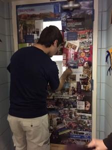 Students decorate their second period class' door with college themes for college week. 