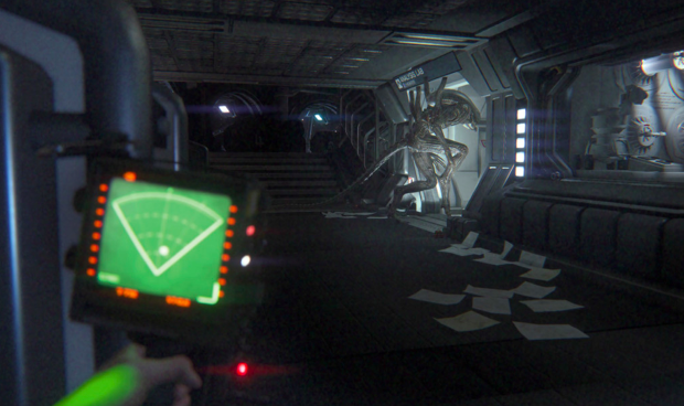 Player using Motion Tracking Unit to find the Alien entity. The motion tracking detects all movement, and beeps loudly depending on how near the enemy really is. The motion tracker can sometimes be your best friend, but also become your enemy. Photo Courtesy by SEGA/ The Creative Assembly.  