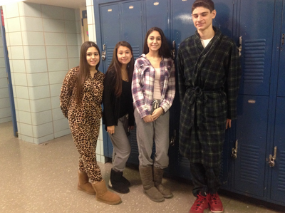 Students of all grades came together to participate in Pajama Day, the first day of Spirit Week. There were blankets, onesies, and flannel all throughout the school. Photo by Gabriella Grimando. 
