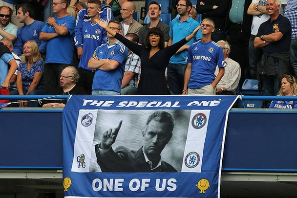 Fans celebrate the success of their club Chelsea Fc by creating a banner of the coach above (Jose Mourinho.) Mourinho is praised for leading chelsea into the top of barclays premier league table.
