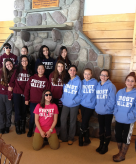 Last year’s 8th grade students pose for a picture in the dining hall after eating lunch. Students then had fun hiking to the frozen waterfall. Photo by Katelyn Puzzo.