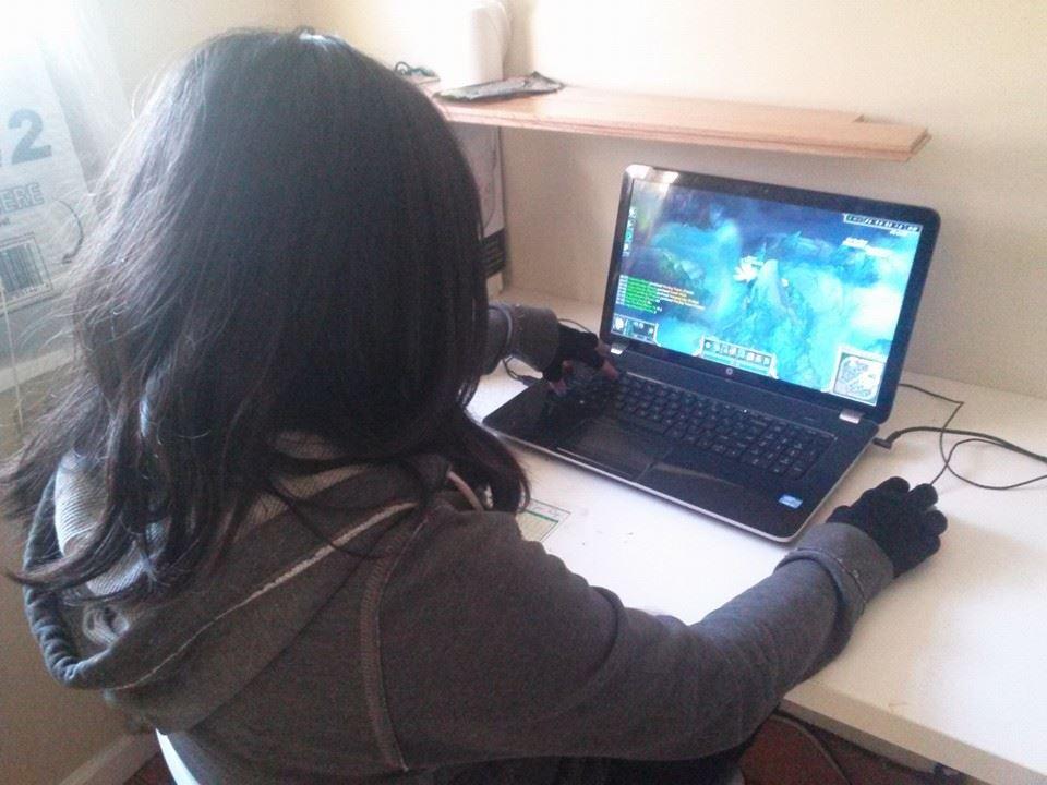 A student comes home after a long, tiring day of school. She relaxes by doing her usual after school activities. This includes Skyping with her friends while playing League of Legends.
Picture taken by Keith Loh.