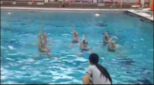 Heejin Kim is a junior who not only manages schoolwork and her home life but takes on synchronized swimming. Synchronized swimming is an activity of swimming, dancing, and gymnastics all in one. Picture is a screenshot from a video recorded by Heejin Kim.