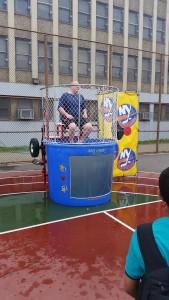 As part of the PTA hosted Spring Fling, there was a dunk tank that featured Mr. Nisonoff and Mrs. Schneider. Students and friends alike stood on line to throw a ball in the hopes of hitting a target that would dunk the person in the hot seat. Photo by Markella Giannakopoulos.