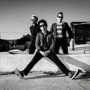 Photo of Green Day's members. Photo attribution to @GreenDay twitter account.
