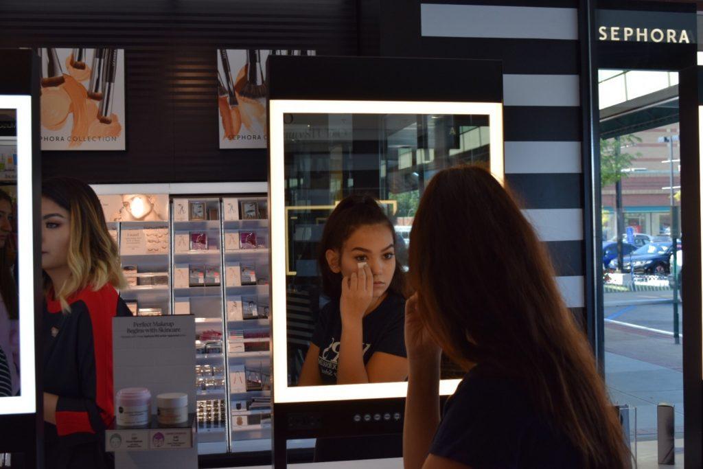 Junior journalist testing out the beauty bar that Sephora offers to their customers
Photo by Serena Minca and Amanda Triantafellou
