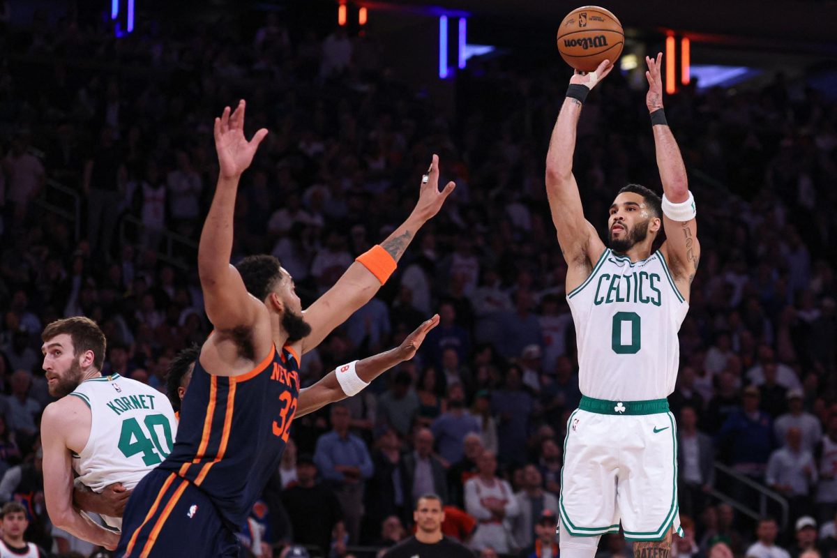 May 12, 2025; New York, New York, USA; Boston Celtics forward Jayson Tatum (0) shoots the ball as New York Knicks center Karl-Anthony Towns (32) defends in the second half during game four of the second round for the 2025 NBA Playoffs at Madison Square Garden. Mandatory Credit: Vincent Carchietta-Imagn Images/ File Photo