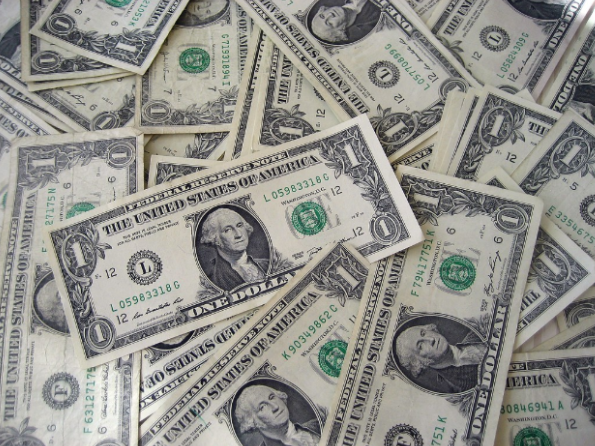 "Dollar Bills" by 401(K) 2013 is licensed under CC BY-SA 2.0.